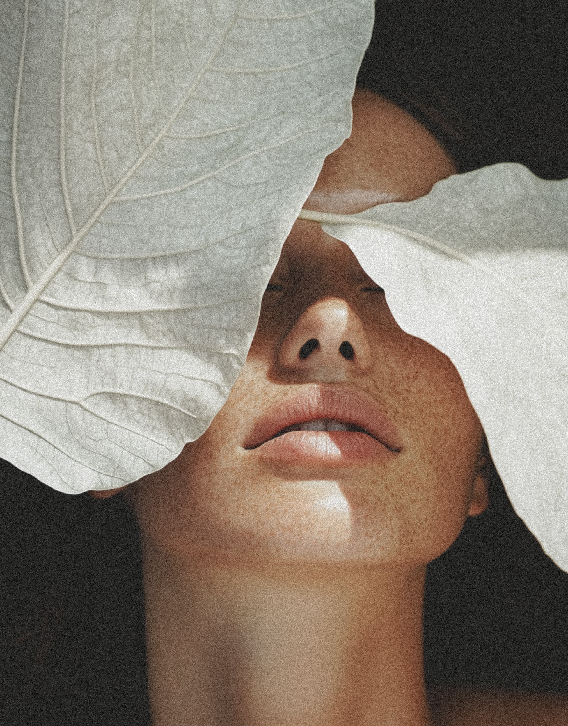 Woman receiving professional facial treatment